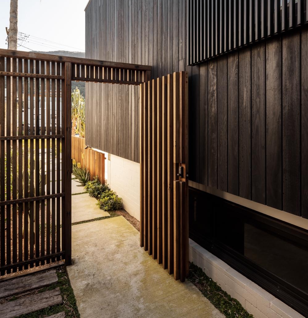 elegant gateway made from charred timber